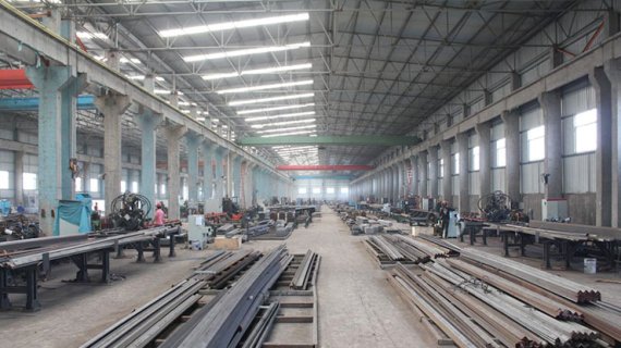 Angle steel cutting, typing, and punching machine